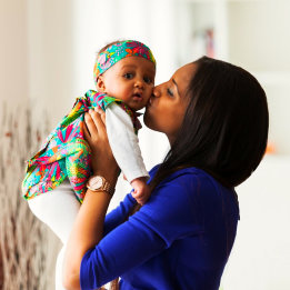 A woman taking of her child